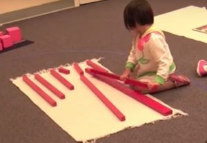 Montessori Sensory Activity Red Rods of Varying Lengths